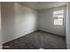 A carpeted bedroom featuring a window providing lots of natural light at 32661 N Newby Dr, San Tan Valley, AZ 85143