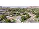 Scenic aerial view of the property with mountain views and lush landscaping at 3301 E Elm St, Phoenix, AZ 85018