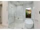 Spacious bathroom featuring a glass enclosed shower with views of the backyard at 3301 E Elm St, Phoenix, AZ 85018