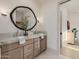 Elegant bathroom featuring double sinks, marble countertops, and modern fixtures at 3301 E Elm St, Phoenix, AZ 85018