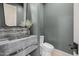 Elegant powder room with designer sink, modern fixtures, and stylish finishes at 3301 E Elm St, Phoenix, AZ 85018