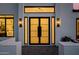 Stylish front door entrance featuring modern design and inviting lighting at 3301 E Elm St, Phoenix, AZ 85018