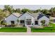 Aerial view of a modern home with a well-manicured lawn, stylish landscaping, and a welcoming entryway at 3301 E Elm St, Phoenix, AZ 85018