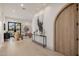 Bright hallway featuring stylish decor and a glimpse into a cozy sitting area at 3301 E Elm St, Phoenix, AZ 85018