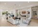 Open living space with stylish furniture, modern fireplace, and hardwood flooring at 3301 E Elm St, Phoenix, AZ 85018