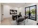 Stylish office features a black desk with an outdoor view from its large window at 3301 E Elm St, Phoenix, AZ 85018