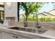 Kitchen sink and window overlooking backyard at 3301 E Elm St, Phoenix, AZ 85018