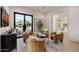 Cozy sitting area with four chairs, stylish decor and a large window at 3301 E Elm St, Phoenix, AZ 85018