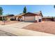 Charming single-story home featuring an attached two-car garage and a well-kept front yard at 3415 E Anderson Dr, Phoenix, AZ 85032