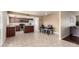 Inviting kitchen and dining area featuring stainless steel appliances and a stylish dining table at 3415 E Anderson Dr, Phoenix, AZ 85032