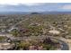 Scenic aerial view of luxury homes nestled in the picturesque desert landscape at 3648 N Sky Point Cir, Mesa, AZ 85207