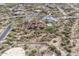Aerial view showcases estate home with backyard pool in a luxury desert community at 3648 N Sky Point Cir, Mesa, AZ 85207