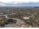 Wide aerial view of high-end community surrounded by desert vegetation and hills at 3648 N Sky Point Cir, Mesa, AZ 85207