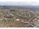 Expansive aerial view of a desert community with custom homes and panoramic mountain views at 3648 N Sky Point Cir, Mesa, AZ 85207
