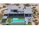 Aerial view of desert home featuring a backyard pool, patio with fireplace, and upper-level deck with outdoor seating at 3648 N Sky Point Cir, Mesa, AZ 85207