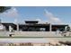 Modern backyard featuring a patio, outdoor dining space, and a pool for leisure and entertainment at 3648 N Sky Point Cir, Mesa, AZ 85207