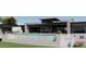 A modern home featuring a unique design, swimming pool, beautiful patio area, and well-maintained landscape at 3648 N Sky Point Cir, Mesa, AZ 85207