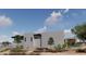 Modern home boasts clean lines, desert landscaping, and a welcoming entrance at 3648 N Sky Point Cir, Mesa, AZ 85207