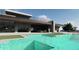 The geometric pool is the centerpiece of this gorgeous home, blending style and outdoor living seamlessly at 3648 N Sky Point Cir, Mesa, AZ 85207