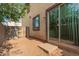 Backyard with dirt and gravel, featuring a small patio at 3713 S 54Th Ln, Phoenix, AZ 85043