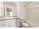 Bathroom features a single sink vanity, toilet, and shower-tub combo at 3713 S 54Th Ln, Phoenix, AZ 85043