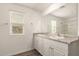 Bathroom featuring double sink vanity and large mirror at 3713 S 54Th Ln, Phoenix, AZ 85043