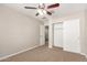 Bedroom with closet space and a ceiling fan, offering natural light at 3713 S 54Th Ln, Phoenix, AZ 85043