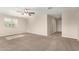 Large bonus room featuring plush carpeting and ceiling fan at 3713 S 54Th Ln, Phoenix, AZ 85043