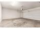 Spacious garage with a door, providing secure parking and storage at 3713 S 54Th Ln, Phoenix, AZ 85043