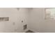 Unfinished Laundry room with hookups and natural light at 3713 S 54Th Ln, Phoenix, AZ 85043