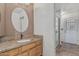 Bathroom with vanity featuring granite countertop and undermount sink at 4207 W Soft Wind Dr, Glendale, AZ 85310