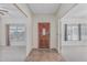 Inviting entryway featuring tile floors and clear views of adjacent rooms and windows at 4207 W Soft Wind Dr, Glendale, AZ 85310
