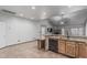 Open concept kitchen with granite counters, stainless appliances and seamless access to living spaces at 4207 W Soft Wind Dr, Glendale, AZ 85310