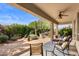 Outdoor patio with furniture and a beautiful desert landscape at 4234 E Narrowleaf Dr, Gilbert, AZ 85298