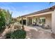 Covered patio with outdoor seating, offering beautiful views of the desert landscaping at 4234 E Narrowleaf Dr, Gilbert, AZ 85298