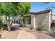 Stucco home with beautiful landscaping, stone accents, and a covered patio at 4234 E Narrowleaf Dr, Gilbert, AZ 85298