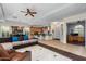 Open living area featuring tile flooring, ceiling fan, and seamless flow to dining and kitchen at 4234 E Narrowleaf Dr, Gilbert, AZ 85298