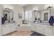 Main bathroom features dual sinks, granite countertops, soaking tub, and natural light at 4234 E Narrowleaf Dr, Gilbert, AZ 85298