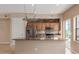Kitchen island with granite counters, stainless steel appliances, and ample storage space at 4617 E Culver St, Phoenix, AZ 85008
