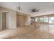 Open-concept layout featuring tile flooring and a kitchen island, ideal for entertaining at 4617 E Culver St, Phoenix, AZ 85008