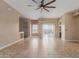Living room featuring tile floors, ample natural light, and sliding glass doors to an outdoor space at 4617 E Culver St, Phoenix, AZ 85008
