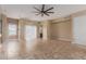 A bright living room boasting tile flooring and large windows, offering comfortable living at 4617 E Culver St, Phoenix, AZ 85008