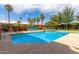 Outdoor swimming pool with lounge chairs surrounded by desert landscaping at 4617 E Culver St, Phoenix, AZ 85008