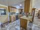Charming kitchen with granite countertops, tile floors and natural wood cabinetry at 4621 E Desert Forest Trl, Cave Creek, AZ 85331
