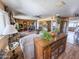 Cozy living room with wooden floors, fireplace and decorative features at 4621 E Desert Forest Trl, Cave Creek, AZ 85331