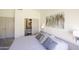 Bedroom featuring a closet with shelving and double doors for storage at 4762 E White Aster St, Phoenix, AZ 85044