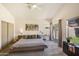 Bright bedroom boasts carpet, a view of the backyard, and double closets at 4762 E White Aster St, Phoenix, AZ 85044