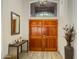 Welcoming front entry featuring a stylish chandelier, mirror and decor at 4762 E White Aster St, Phoenix, AZ 85044
