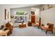 Inviting living room with large windows, comfortable seating and decor at 4762 E White Aster St, Phoenix, AZ 85044