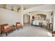 Spacious living room showcases an open floor plan connecting dining, and stylish decor at 4762 E White Aster St, Phoenix, AZ 85044